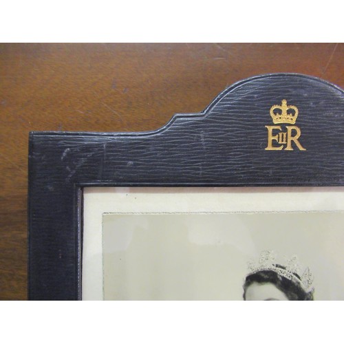 93 - Fine pair of photographs of the young Queen Elizabeth II and Prince Philip, each signed and dated 19... 