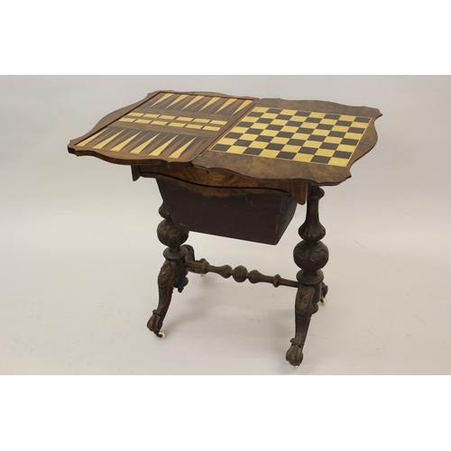 1525 - Victorian figured walnut games / work table, the shaped fold-over swivel top enclosing chess, backga... 