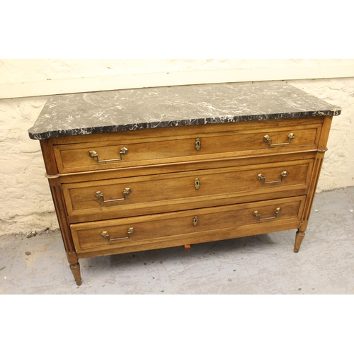 1542 - 19th Century French walnut commode, the later grey variegated marble top above three graduated drawe... 