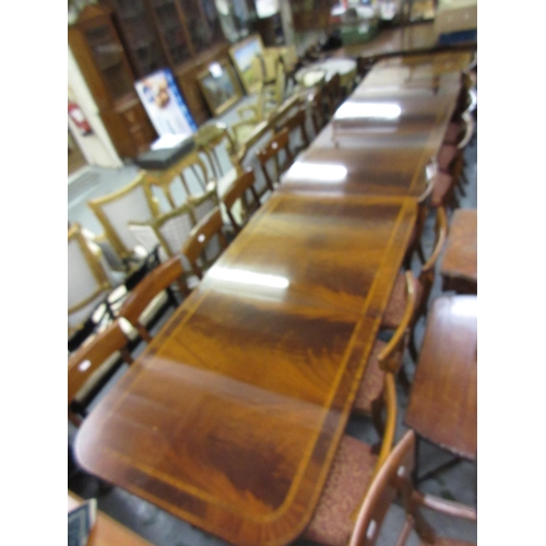 1546 - Good quality reproduction mahogany three pillar D-end dining table, the reeded crossbanded top above... 