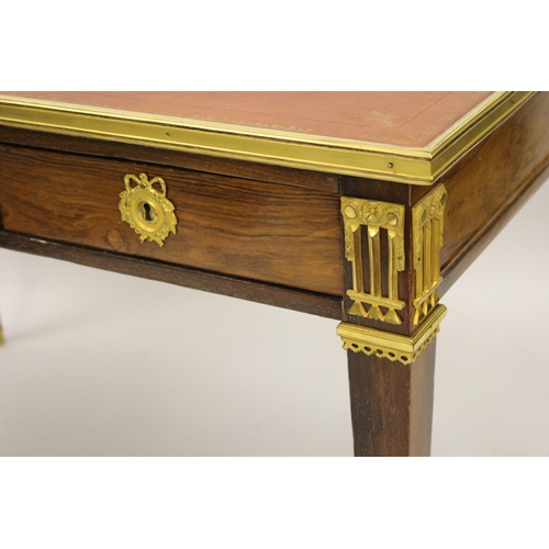 1547 - 19th Century French rosewood and ormolu mounted writing table, the red leather inset top above three... 