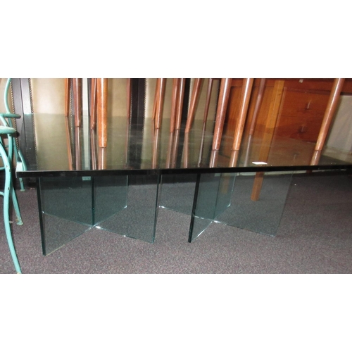 1554 - Modern glass coffee table, the square top 47.5ins, on twin crossover bases