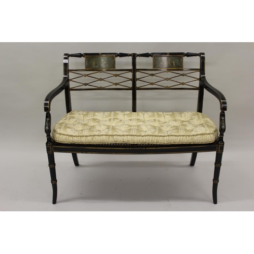 1559 - Fine quality reproduction Regency style ebonised and painted two seat salon sofa, the back with hand... 