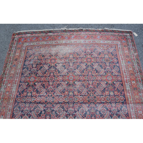 2 - Feraghan rug with an all-over Herati design on a blue ground with borders, 9ft 6ins x 5ft approximat... 