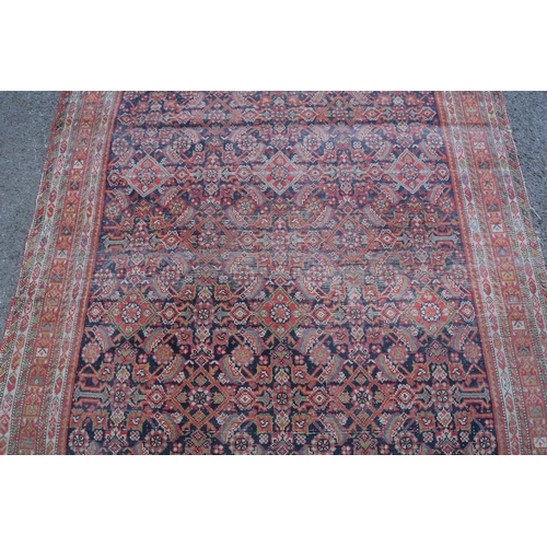 2 - Feraghan rug with an all-over Herati design on a blue ground with borders, 9ft 6ins x 5ft approximat... 