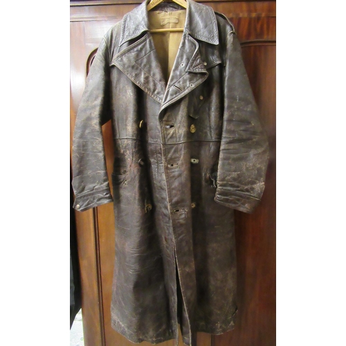 23 - World War II leather trench coat, stamped to the back of one of the fastening studs ' Waldes '