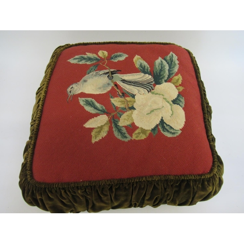 26 - Woolwork floral and bird decorated velvet cushion, approximately 17ins square