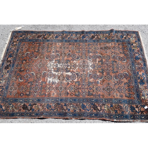 3 - Small Kurdish rug with an all-over stylised floral design on a brick red ground with borders, 4ft 8i... 