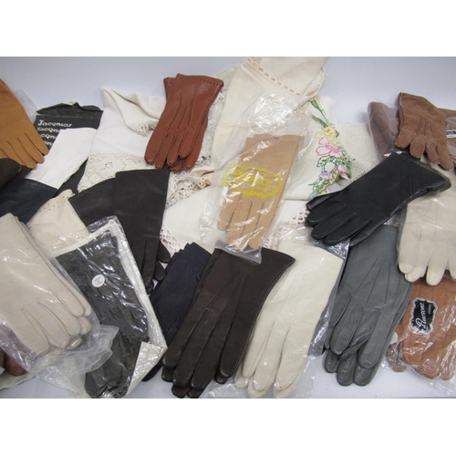 32 - Bag containing a quantity of ladies silk scarves and leather gloves, together with a small quantity ... 