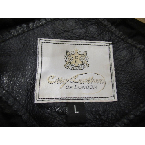 33 - Gentlemans black leather jacket by City Leather Of London, together with a gentleman's Tarpey sheeps... 
