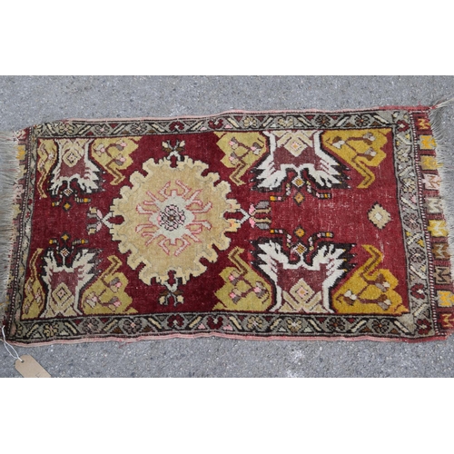 4 - Group of four 20th Century small Chinese rugs and a small earlier prayer rug on red ground with bord... 