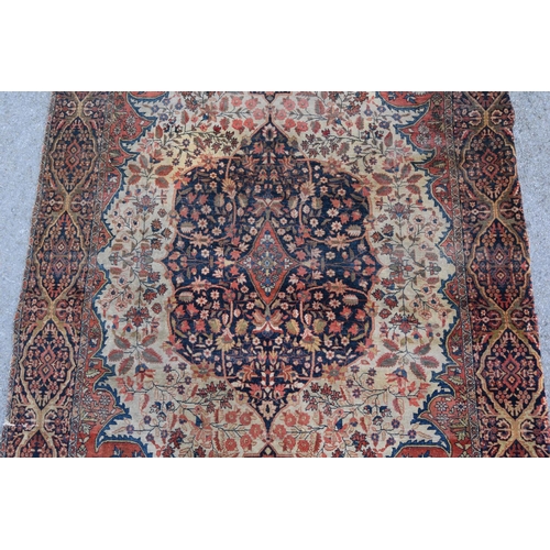 6 - Tabriz rug with a medallion and all-over stylised floral design, with corner designs on an ivory gro... 