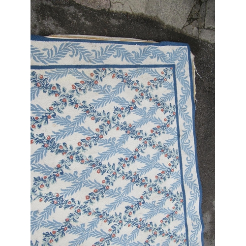 9 - Very large modern Chinese machine woven carpet with an all-over blue floral lattice design on an ivo... 