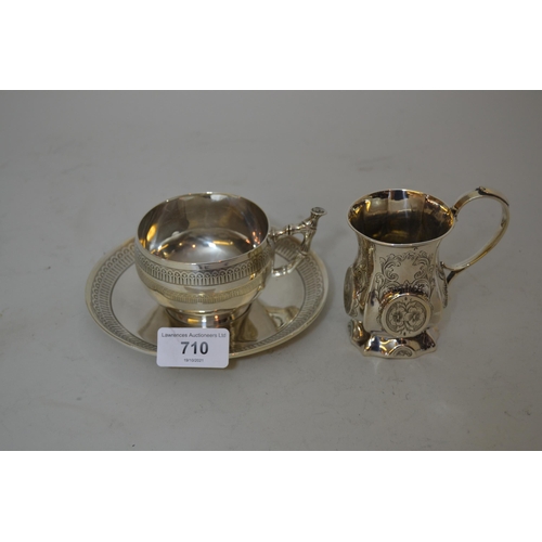 710 - Continental silver cup with saucer and a similar mug