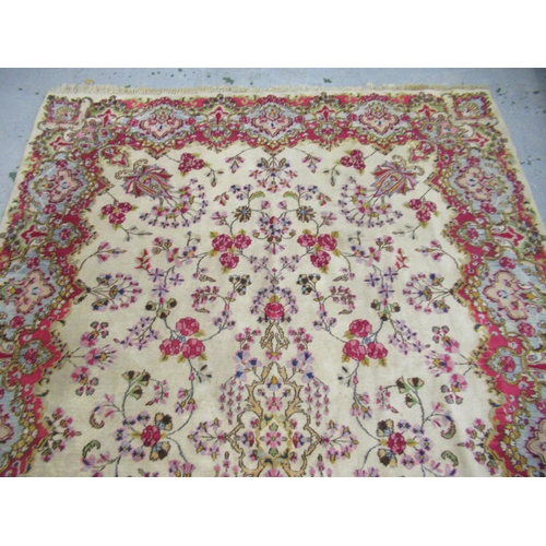 21 - Small Turkoman rug with three rows of eleven gols, on a wine red ground with borders, 6ft x 3ft 10in... 