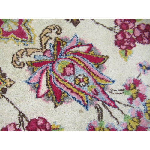 21 - Small Turkoman rug with three rows of eleven gols, on a wine red ground with borders, 6ft x 3ft 10in... 