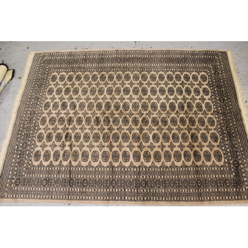 22 - Small Afghan Ziegler mat with a floral design on a dark ground, 2ft 10ins x 2ft 2ins approximately, ... 