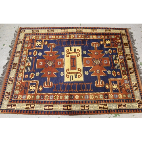 10 - Small Turkish carpet, with a triple medallion and all over design, on a royal blue ground, with poly... 