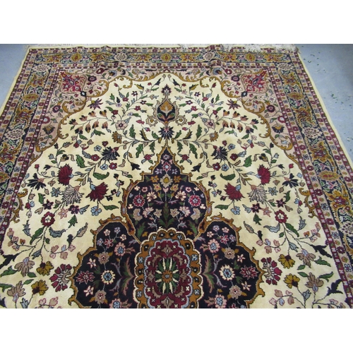 13 - Indian carpet with a lobed medallion and all over floral design on an ivory ground with borders, 155... 