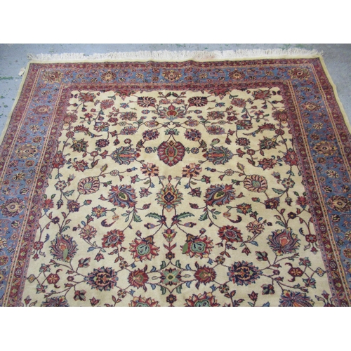 14 - Indian carpet with an all over stylised floral design on ivory ground with pale blue borders, 140ins... 