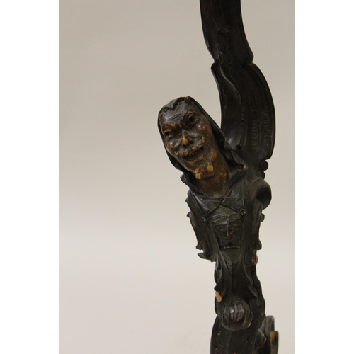 1952 - 19th Century Italian carved and stained figural torchere (at fault), 39ins high