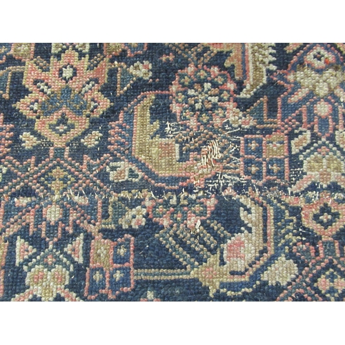 20 - Antique Malayer rug with an all over Herati design centre panel on a midnight blue ground, with wide... 
