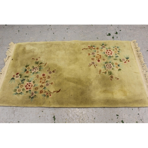 27 - Flat woven coir rug, 7ft square approximately together with a dark brown sheepskin rug and a Chinese... 