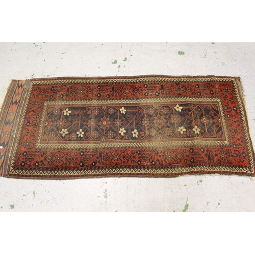 30 - Belouch rug of all over floral design, with multiple borders, approximately 87ins x 42ins, (worn)