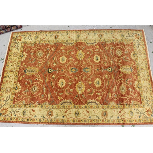 33 - Pakistan Ziegler rug with an all over palmette  design on a brick red field, with ivory borders, 7ft... 