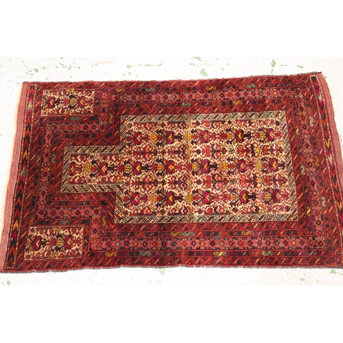 37 - Small Turkoman prayer rug, with an all over stylised floral design on a ivory ground with red ground... 