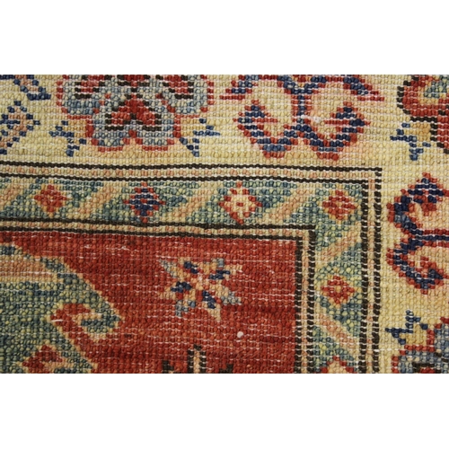 38 - Modern Afghan Ziegler type runner with a repeating medallion and stylised floral design on a brick r... 