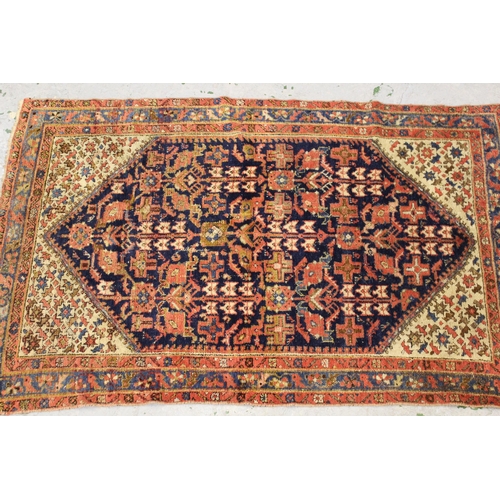 39 - Hamadan rug with all over Herati design on a midnight blue ground with corner designs and border, 6f... 