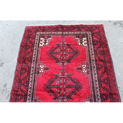 4 - Turkoman rug with typical all-over design, 2.55m x 1.24m