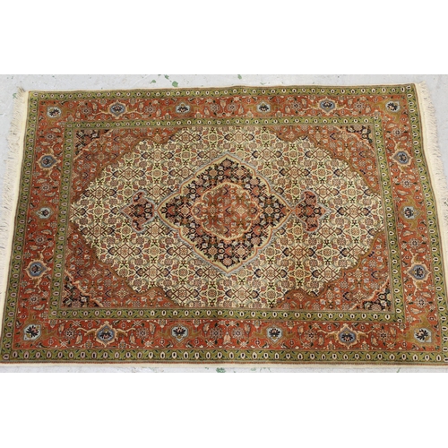 45 - Small Indo-Persian rug with a lobed medallion and all over Herati design on a ivory ground with bric... 