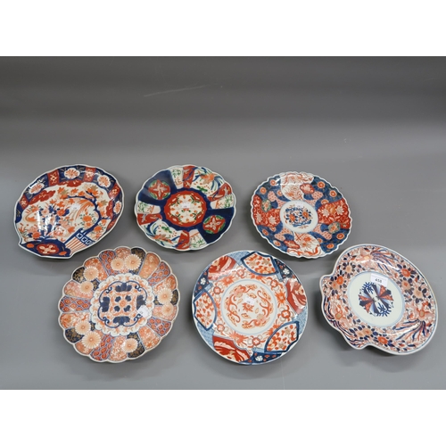 458 - Two Imari iron red and blue decorated scallop shaped plates, together with four similar circular pla... 