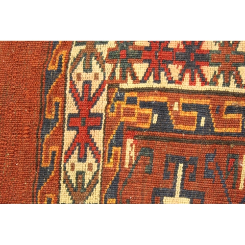 48 - Small Turkoman tent bag with four rows of four gols, on a madder ground with skirt panel, 3ft 4ins x... 