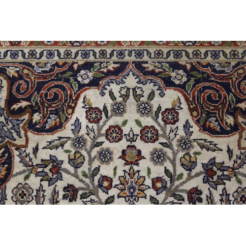 8 - Small Indo-Persian rug with centre medallion and all over floral design, with multiple borders, (wor... 