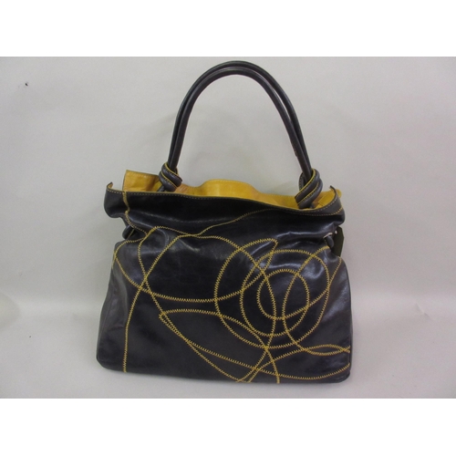 91 - Coccinelle Ladies blue and mustard leather handbag