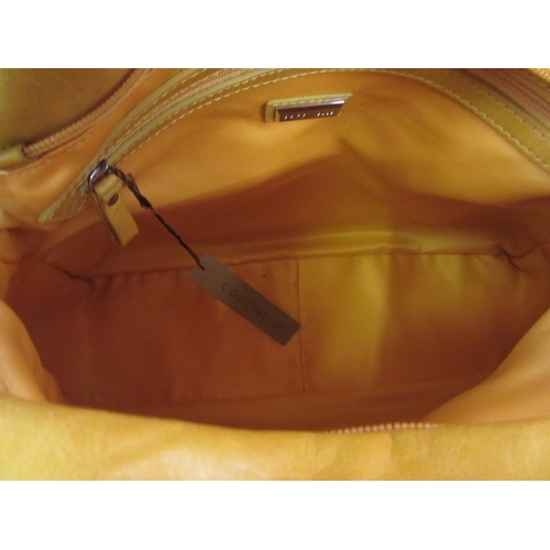91 - Coccinelle Ladies blue and mustard leather handbag