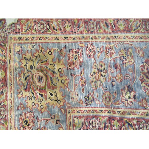 14 - Indian carpet with an all over stylised floral design on ivory ground with pale blue borders, 140ins... 