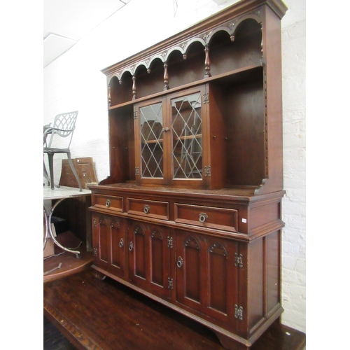 1888 - Reproduction oak dining room suite comprising of a set of six chairs, a draw-leaf refectory style ta... 