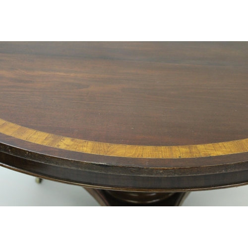 1898 - 19th Century mahogany circular tilt-top table having crossbanded top with central tapering column an... 