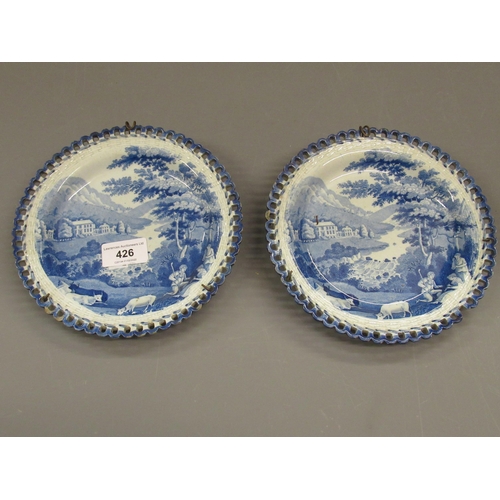 426 - Pair of 19th Century English blue and white transfer printed ribbon plates decorated with a river la... 