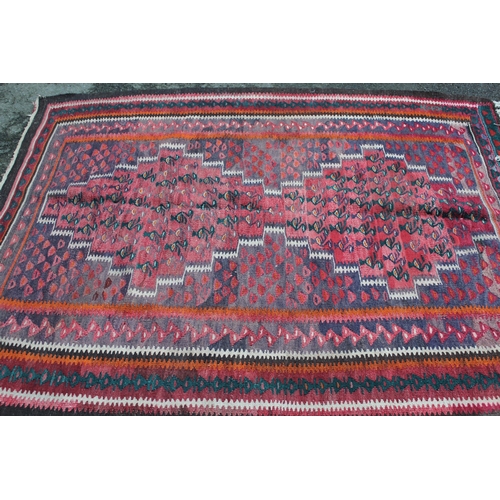 42C - Kelim rug with twin medallion design, 6ft 6ins x 5ft approximately