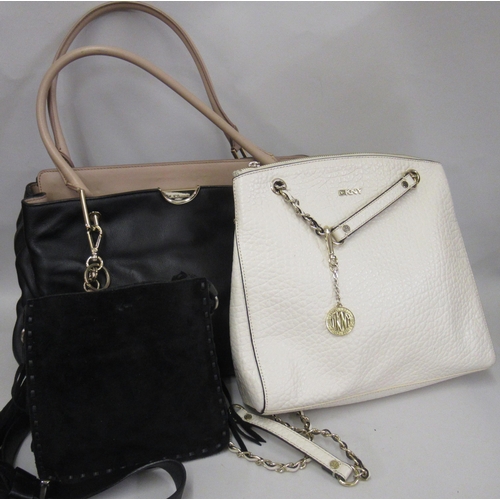55 - DKNY Cream pebbled leather shoulder bag with chain handles, another DKNY black suede shoulder bag an... 