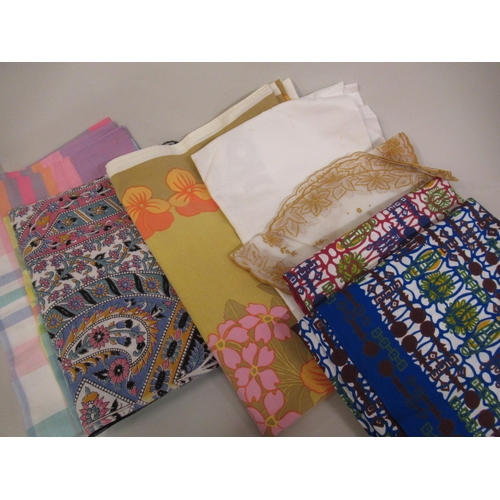 62 - Quantity of damask, crochet and embroidered table covers and various fabrics etc.
