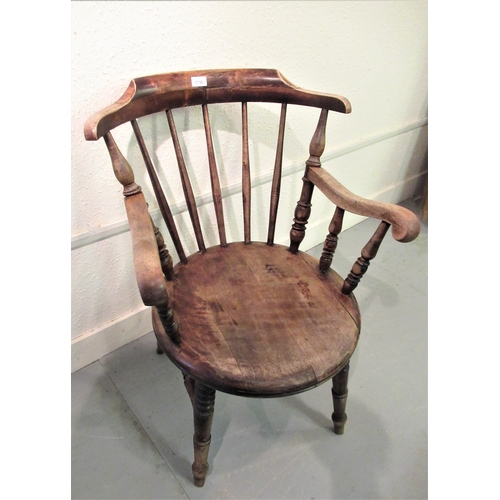 Early 20th Century beechwood spindle back elbow chair, the c... Barnebys