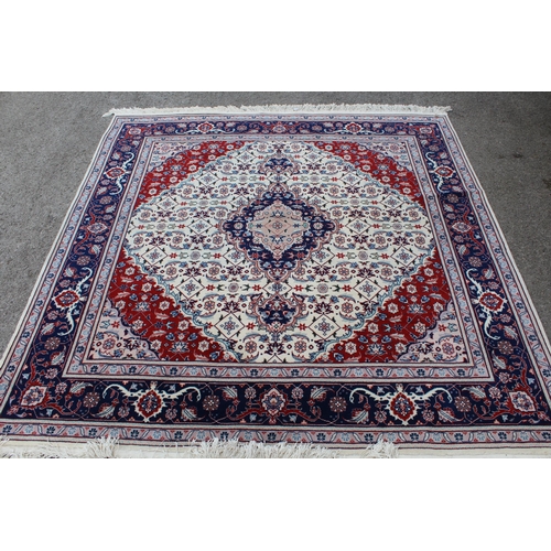 1 - Indo Persian carpet with centre medallion and all-over floral design with multiple borders on a beig... 