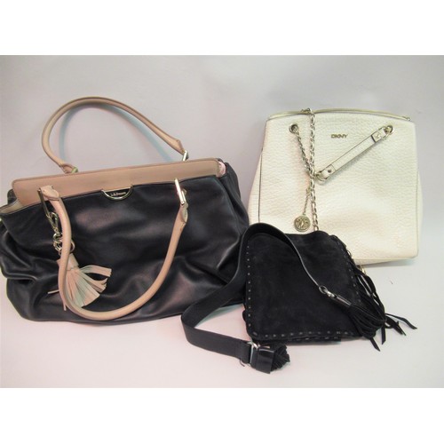 32 - DKNY Cream pebbled leather shoulder bag with chain handles, another DKNY black suede shoulder bag an... 