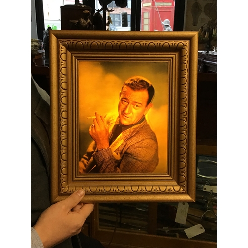52 - John Wayne Lightbox. Very unusual boxed lenticular picture frame of John Wayne. The back needs to be... 